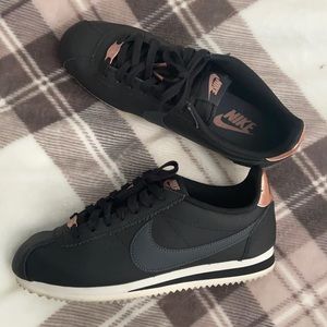 Women’s black Nike Cortez
